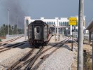Vlak odjd smr Thajsko, v pozad nov stanice v Arau, zatm bez provozu
