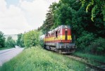 742.344 (DKV Louny) v nkl. vlaku z Rakovnka ped Berounem-Zvod, 22.5.2003