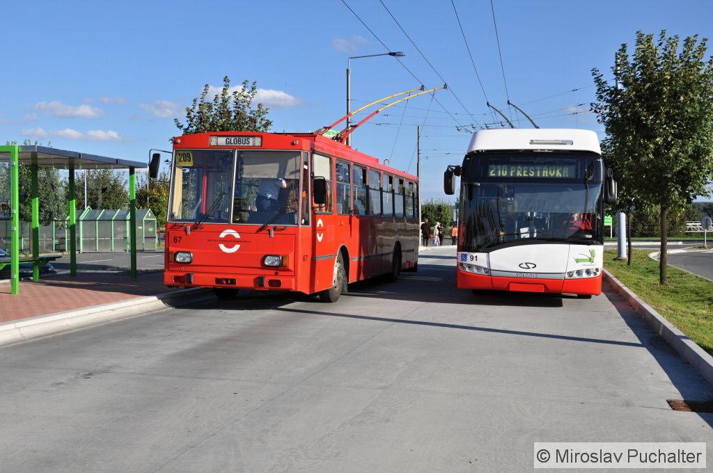 Ev. �. 67 (�koda 14 Tr 10/6) a ev. �. 91 (Solaris Trollino 12 AC III) v kone�n� 
